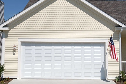 residential raised short panel white garage door