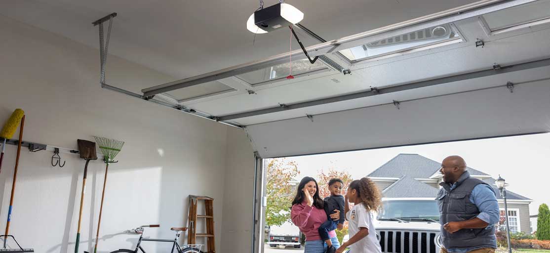 Homeowner  receiving a consultation for garage door opener replacement