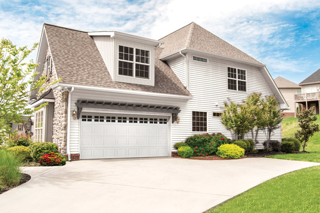 double car traditional garage door with decorative windows